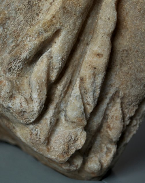 Roman Art | Online Scholarly Catalogue | Art Institute of Chicago | Detail showing the drill marks between the straps of the cuirass of Fragment of a Portrait Statue of a Man (2nd century A.D.).