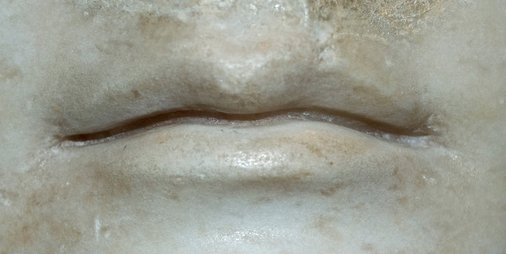 Detail showing the groove carved between the lips of Portrait Head of a Woman (A.D. 117/38). The Art Institute of Chicago, 1962.926.