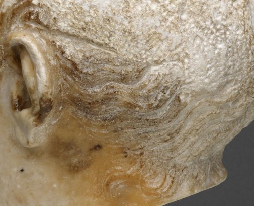 Detail of Portrait Head of a Woman (A.D. 117/38) showing the largely intact curls at the base of the neck on the proper left side. The Art Institute of Chicago, 1962.926.