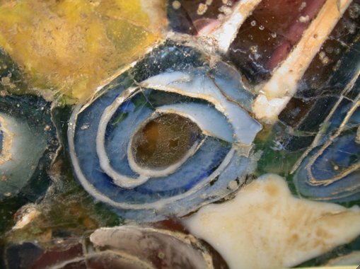 Detail of Dish (mid-2nd/early 1st century B.C.) showing the single spiral with an amber center. The Art Institute of Chicago, 2004.722.