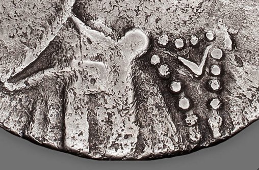 Detail showing the lack of articulation in the garment on the obverse of Tetradrachm (Coin) Portraying Queen Cleopatra VII (37/33 B.C.). The Art Institute of Chicago