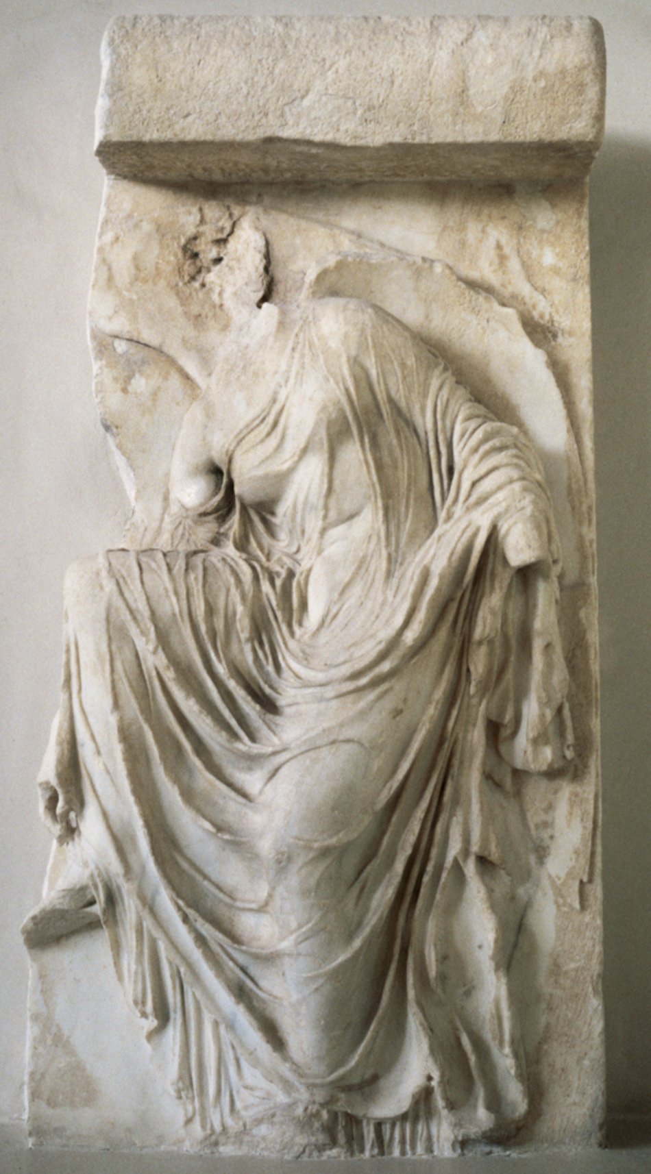 Relief of Nike adjusting her sandal, from the parapet of the Temple of Athena Nike, Athens, Acropolis Museum, Athens, inv. ACR 973; on Art Resource